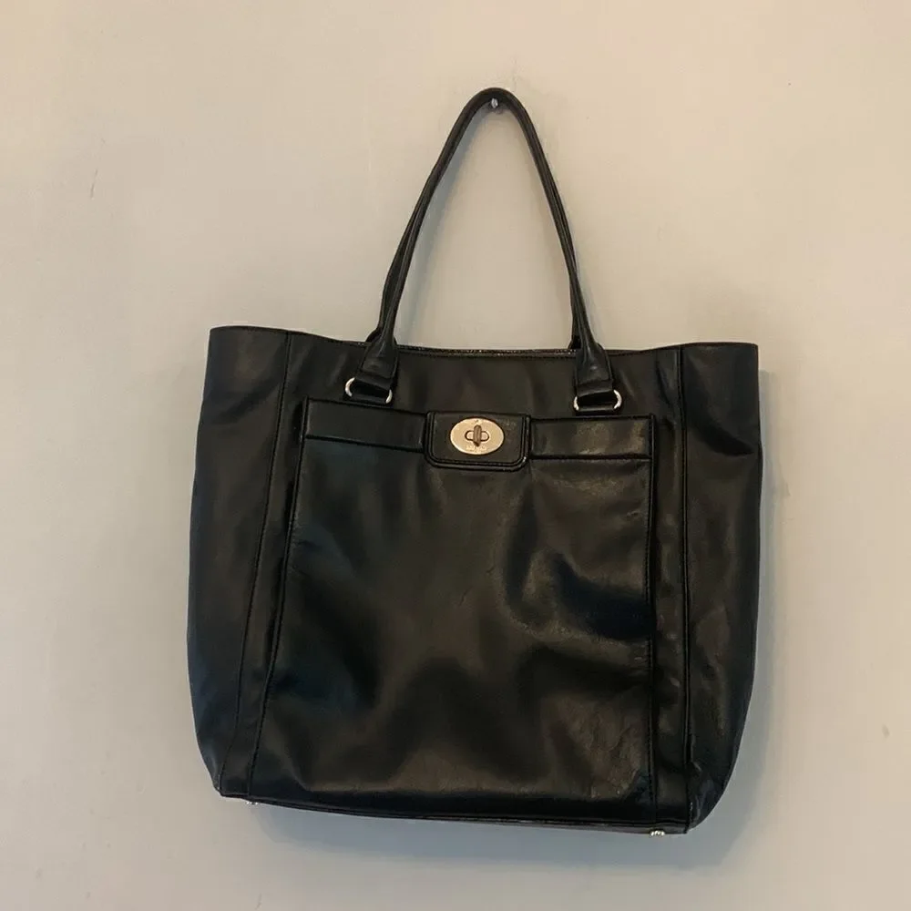 Kate Spade black leather tote bag with exterior and interior pockets